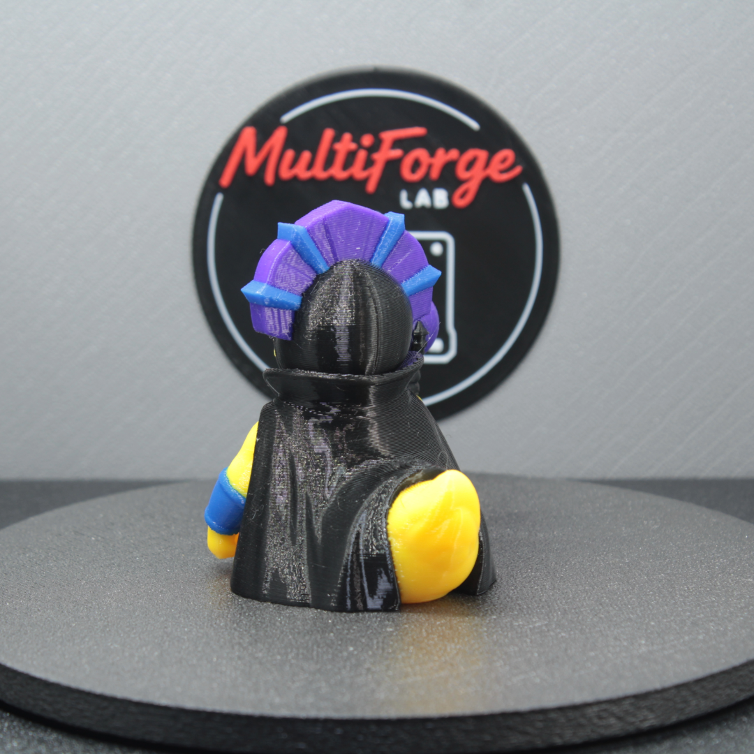 Evil Ducklyn 3D printed dash duck rear angle showing black hooded cape and purple blue headdress detail - MultiForge Lab jeep accessory