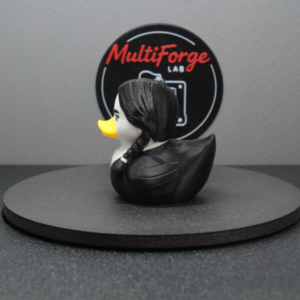 Side view of Gothic School Girl Dash & Cruise Duck showing black hair, braid, white collar, and sculpted wing.