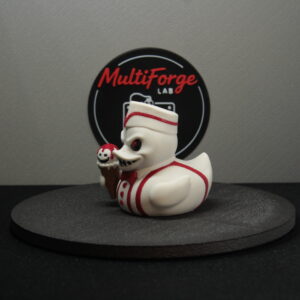 I-Scream Terrorizer Dash & Cruise Duck figurine, side profile view showing the full soda jerk uniform silhouette