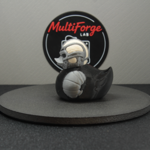 Uber Duckheese Dash & Cruise Duck in black and silver cyber armor with bone white skin, shown from the side.