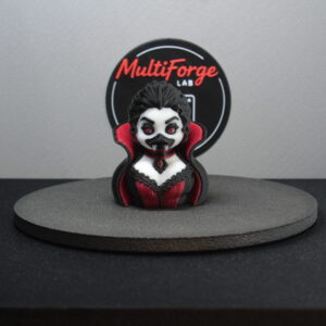 Velvet Fang Vampire Dash & Cruise Duck figurine, straight-on front view showing the fangs and crimson accents